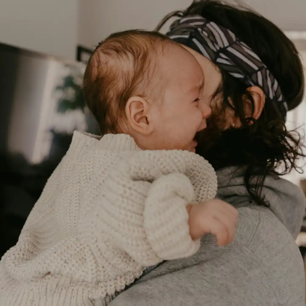 parent using sensory OT technique with newborn” or “baby sleeping after sensory regulation